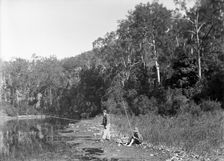 Frederick George Walker fishing with unknown boy Coomera River, c1880s. Creator: Robert Augustus Henry L'Estrange