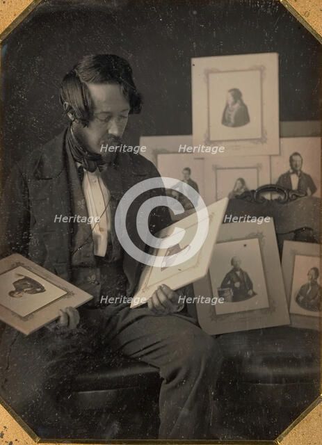 Frederick Langenheim Looking at Talbotypes, ca. 1849-51. Creators: William Langenheim, Frederick Langenheim.