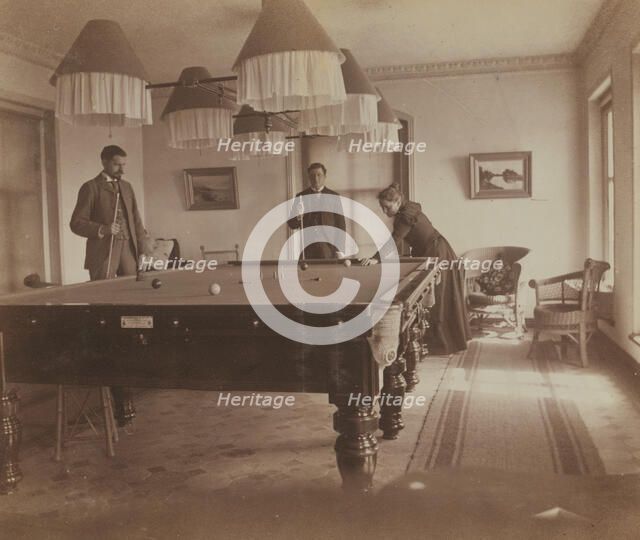 Frederick S Pray, David M Clarkson, and Sarah E Smith, posed by the billiard table..., Russia, 1899. Creator: Eleanor Lord Pray.