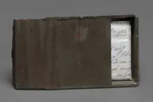 Freedom papers and handmade tin carrying box belonging to Joseph Trammell, 1852. Creator: Joseph Trammell