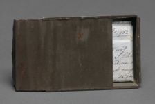 Freedom papers and handmade tin carrying box belonging to Joseph Trammell, 1852. Creator: Joseph Trammell