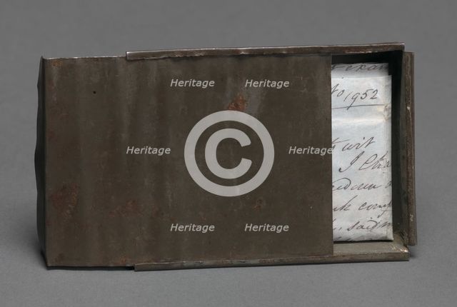 Freedom papers and handmade tin carrying box belonging to Joseph Trammell, 1852. Creator: Joseph Trammell.