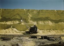 Freeport Sulphur Co., 60 foot high vat of sulphur, Hoskins Mound, Texas, 1943. Creator: John Vachon