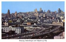 Freeway interchanges and skyline of San Francisco, California, USA, 1957