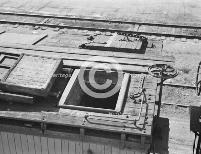 Freight car at potato shed, Tulelake, Siskiyou County, California, 1939. Creator: Dorothea Lange.