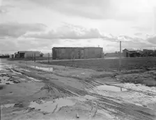 Freightcar converted into home in "Little Oklahoma", California, 1936. Creator: Dorothea Lange