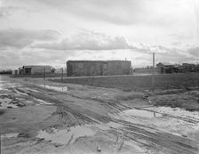Freightcar converted into home in "Little Oklahoma", California, 1936. Creator: Dorothea Lange