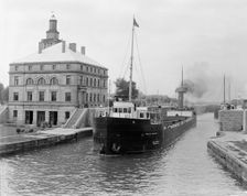 Freighter in Poe Lock, looking down, Sault Ste. Marie, Mich., between 1903 and 1910. Creator: Unknown