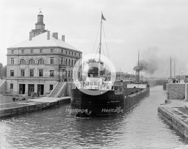 Freighter in Poe Lock, looking down, Sault Ste. Marie, Mich., between 1903 and 1910. Creator: Unknown.