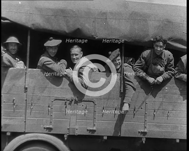 French Military Vehicles and Soldiers Crossing the Belgian Frontier To Take up Defensive..., 1940. Creator: British Pathe Ltd.
