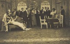 French or Belgian prisoners of war, some in drag, posing on stage during a crowded scene..., [1918?] Creator: Unknown