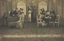 French or Belgian prisoners of war, some in drag, posing on stage during a crowded scene..., (1918?) Creator: Unknown