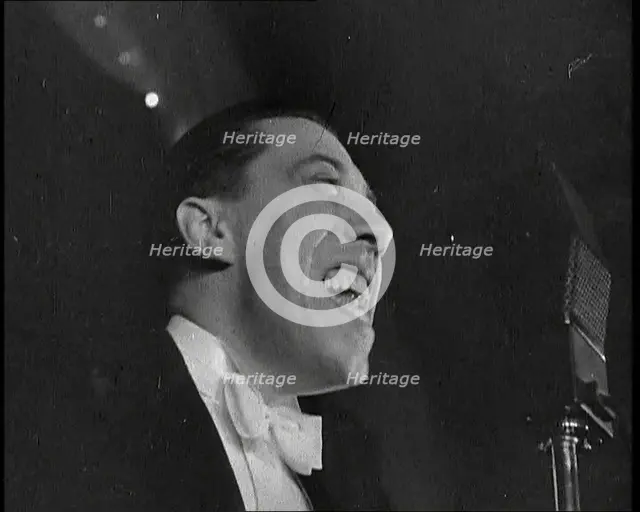 French Actor and Singer, Fernandel Singing a Song, 1930s. Creator: British Pathe Ltd.