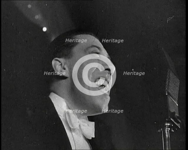 French Actor and Singer, Fernandel Singing a Song, 1930s. Creator: British Pathe Ltd.