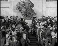 French and British Crowd Watching as a Union Flag and Tricolore Are Removed to Reveal..., 1920. Creator: British Pathe Ltd