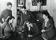 French citizens listening to a broadcast by Vichy deputy premier Admiral Darlan, 23 May, 1941