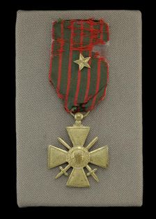 French Croix de Guerre medal issued to Cpl. Lawrence Leslie McVey, 1918. Creator: Unknown