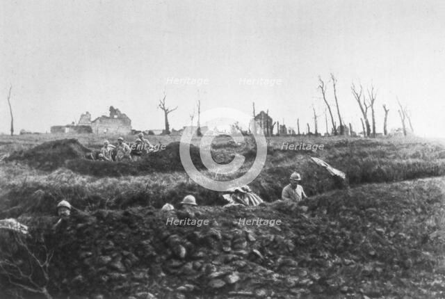 French infantry establishing fallback positions in front of a ruined farm, Picardy, France, 1918. Artist: Unknown