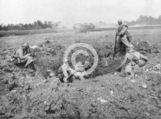 French infantry resting in a shell hole, Chemin des Dames, France, 11 June 1918. Artist: Unknown