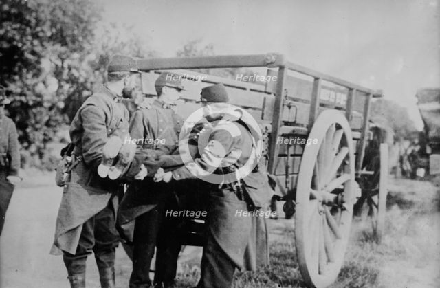 French pick up dead near Charleroi, 21 Oct 1914. Creator: Bain News Service.
