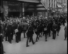 French Police Checking People's Papers Outside a Cafe in Paris, 1940. Creator: British Pathe Ltd