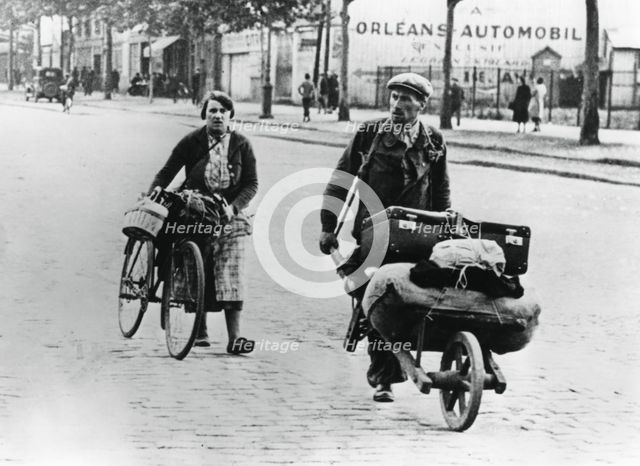 French refugees returning home after the fall of France to the Germans, Paris, July 1940. Artist: Unknown