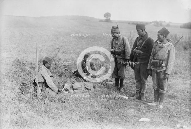 French succoring wounded German, 1914. Creator: Bain News Service.