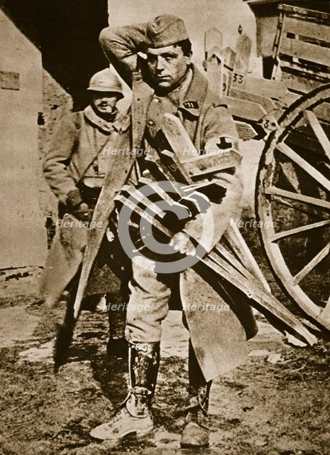 French soldier with wooden crosses to be placed on temporary graves, World War I, c1914-c1918. Artist: Unknown