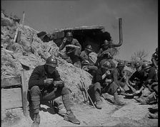 French Soldiers Eating a Meal in a Dug Out, 1940. Creator: British Pathe Ltd