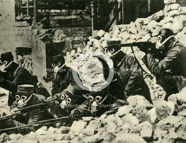 French soldiers wearing gas masks, First World War, c1915, (c1920). Creator: Unknown.