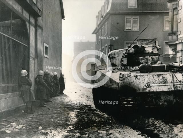 French troops take cover in Colmar, France, c.1940s. Artist: Unknown