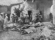 French wounded being removed during an attack to a farm in the rear of the lines 1915