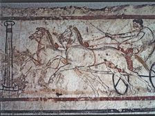 Fresco from a Lucan tomb in Paestum depicting a man in a carriage drawn by two horses