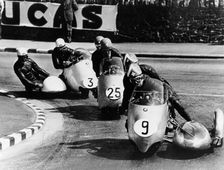 Fritz Scheidegger, Walter Schneider and Helmut Fath competing in a sidecar race, 1959