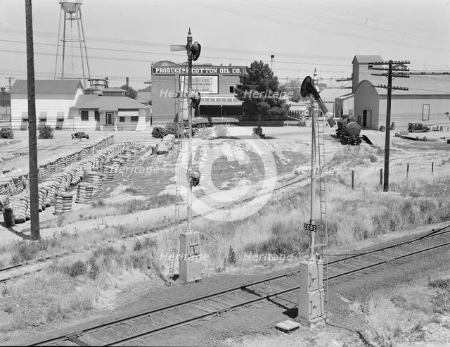 From the overpass approaching Fresno, between Tulare and Fresno, California, 1939. Creator: Dorothea Lange.