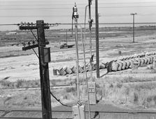 From the overpass approaching Fresno, between Tulare and Fresno, California, 1939. Creator: Dorothea Lange