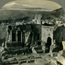 From the Ruins of Taormina's Ancient Greek Theater to Snow-capped Mt. Etna, Sicily c1930s. Creator: Unknown