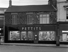 Front of Pettits Shoe Shop, Mexborough, South Yorkshire, 1960. Creator: Michael Walters