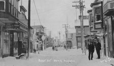 Front Street covered with snow, between c1900 and c1930. Creator: Lomen Brothers