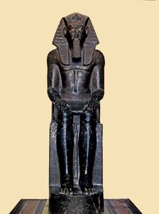Front view of the seated statue of Ramses II, made in diorite, it comes from Tanis