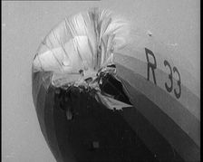 Front View of the R.33 Zeppelin With a Dented and Damaged Nose After Flying Through a Storm, 1924. Creator: British Pathe Ltd