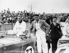 FS Barnes in the centre, AH Langley to his right, with a Singer Nine Sports car, 1930s