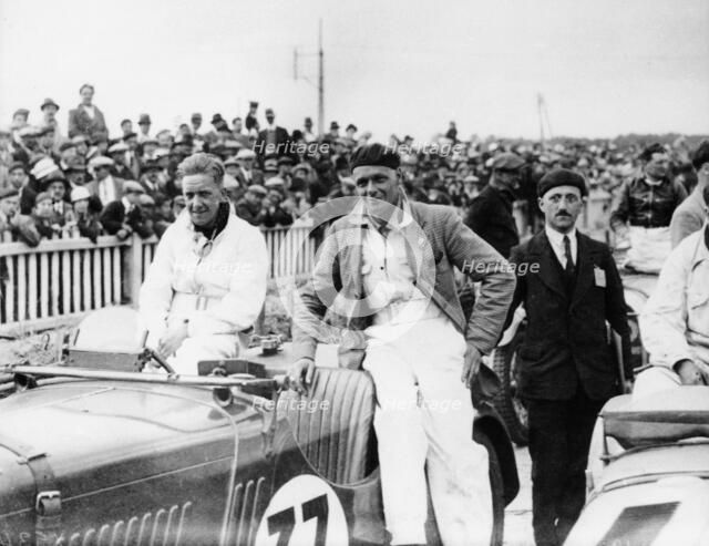 FS Barnes in the centre, AH Langley to his right, with a Singer Nine Sports car, 1930s. Artist: Unknown