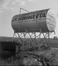 Fuel tank on the Aldridge Plantation, Mississippi, 1937. Creator: Dorothea Lange