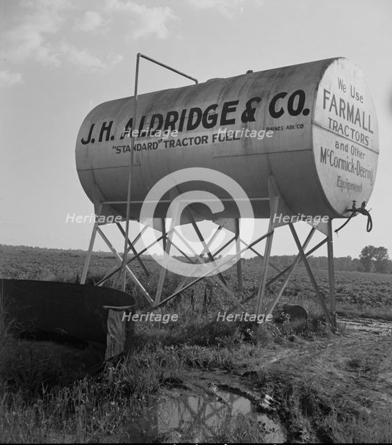Fuel tank on the Aldridge Plantation, Mississippi, 1937. Creator: Dorothea Lange.