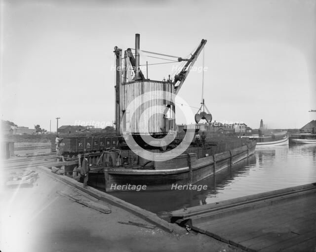 Fueling lighter with clam shell hoist, Ashtabula, Ohio, ca 1900. Creator: Unknown.