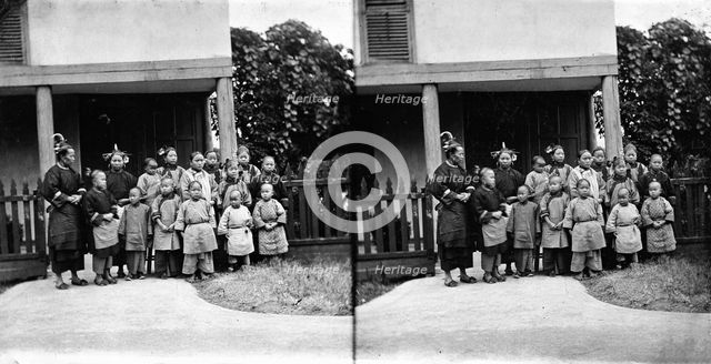 Fukien province, China: women and children outside a school (?), 1871. Creator: John Thomson.