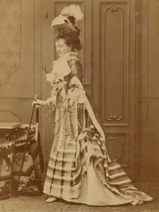 Full-length portrait of a well-dressed woman with walking stick, 1880s. Creator: Michele Schemboche