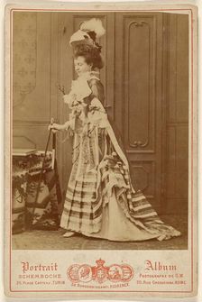 Full-length portrait of a well-dressed woman with walking stick, 1880s. Creator: Michele Schemboche