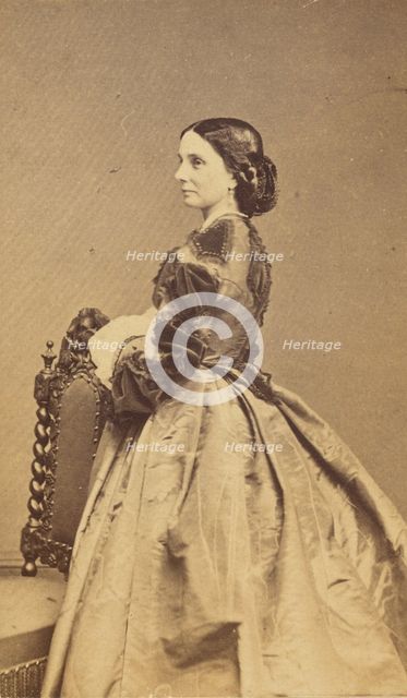 Full-length portrait of an unidentified woman in profile, 1864. Creator: Charles De Forest Fredricks.